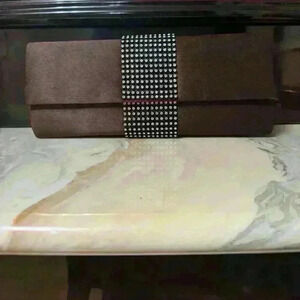Woman’s clutch brown bag with chain and  crystals